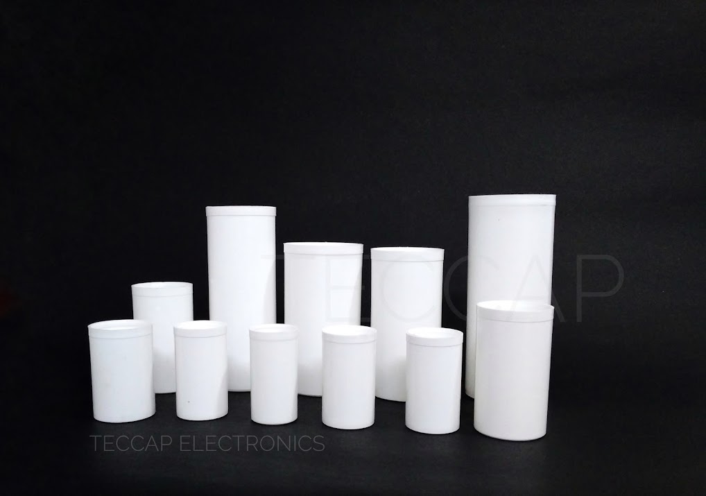 Capacitor casings - white cylinders